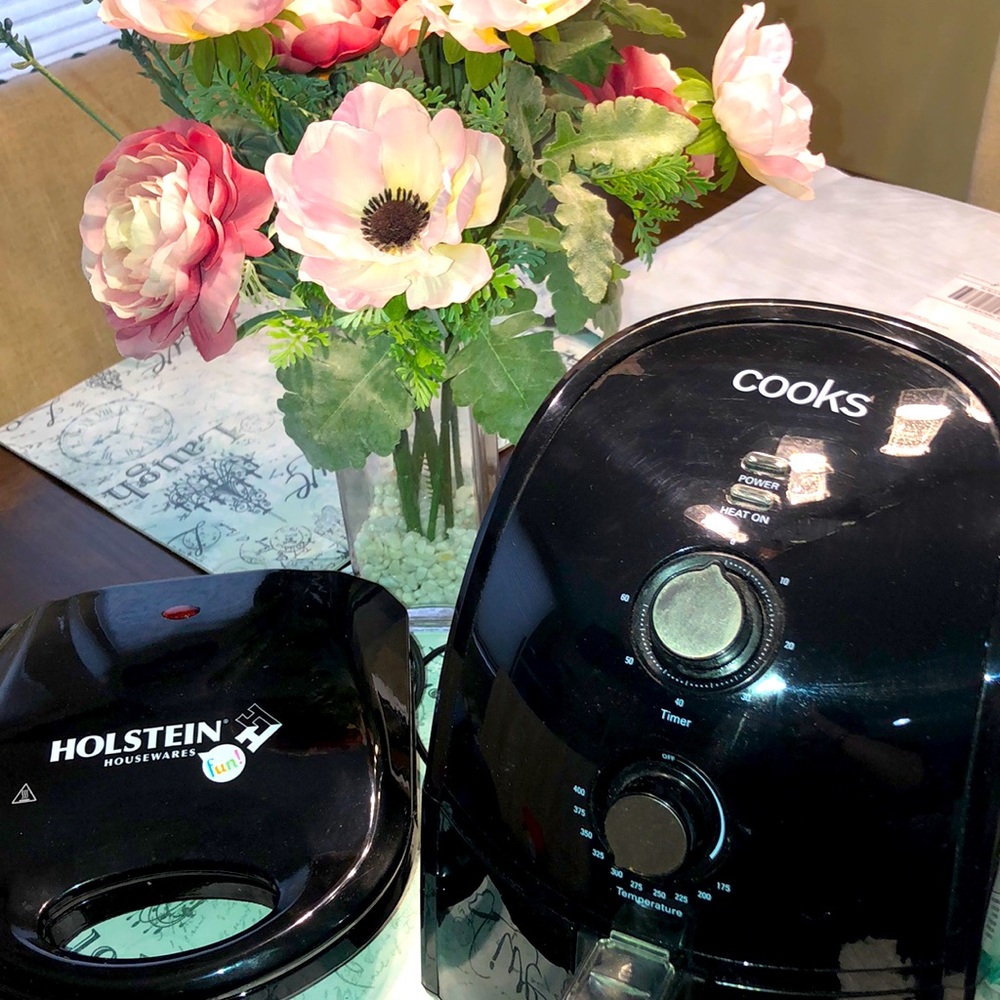 Cooks and Holstein black kitchen appliances.